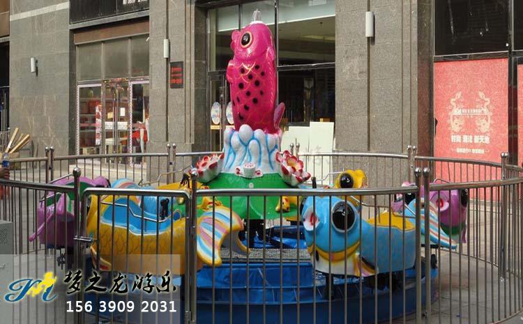 ���~�����T